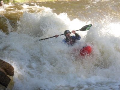 Kayaking a rapid